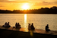 Lawns by Huong River draw crowds for sunset views